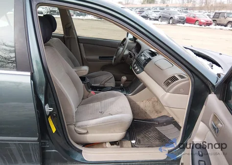 2005 Toyota Camry Le z USA, uszkodzony, nr VIN 4T1BE30KX5U045701